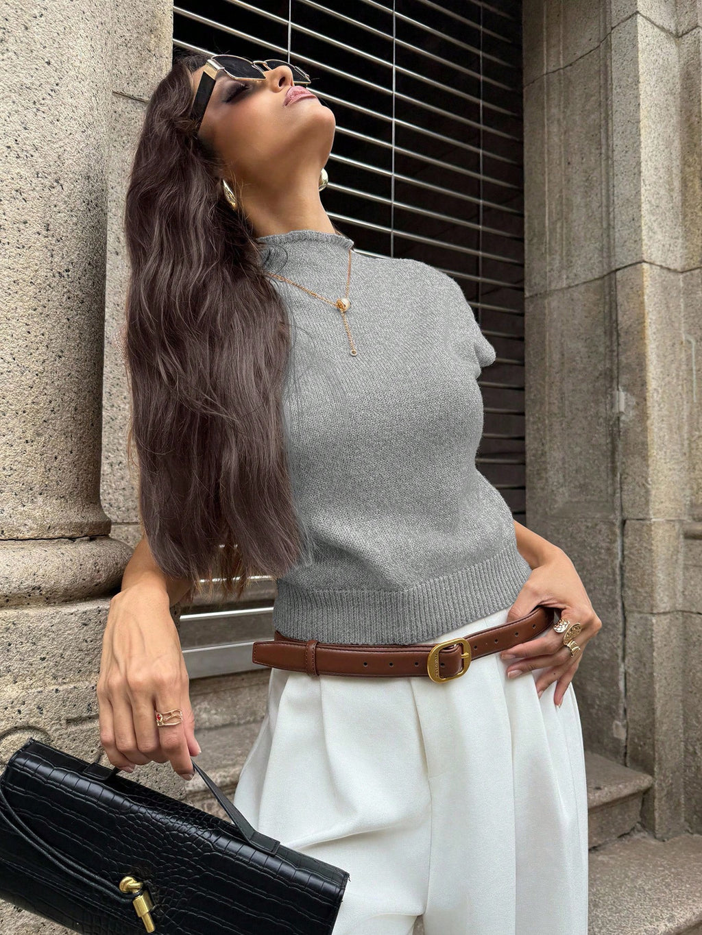 Elegant sleeveless knit vest, high neck, loose and versatile