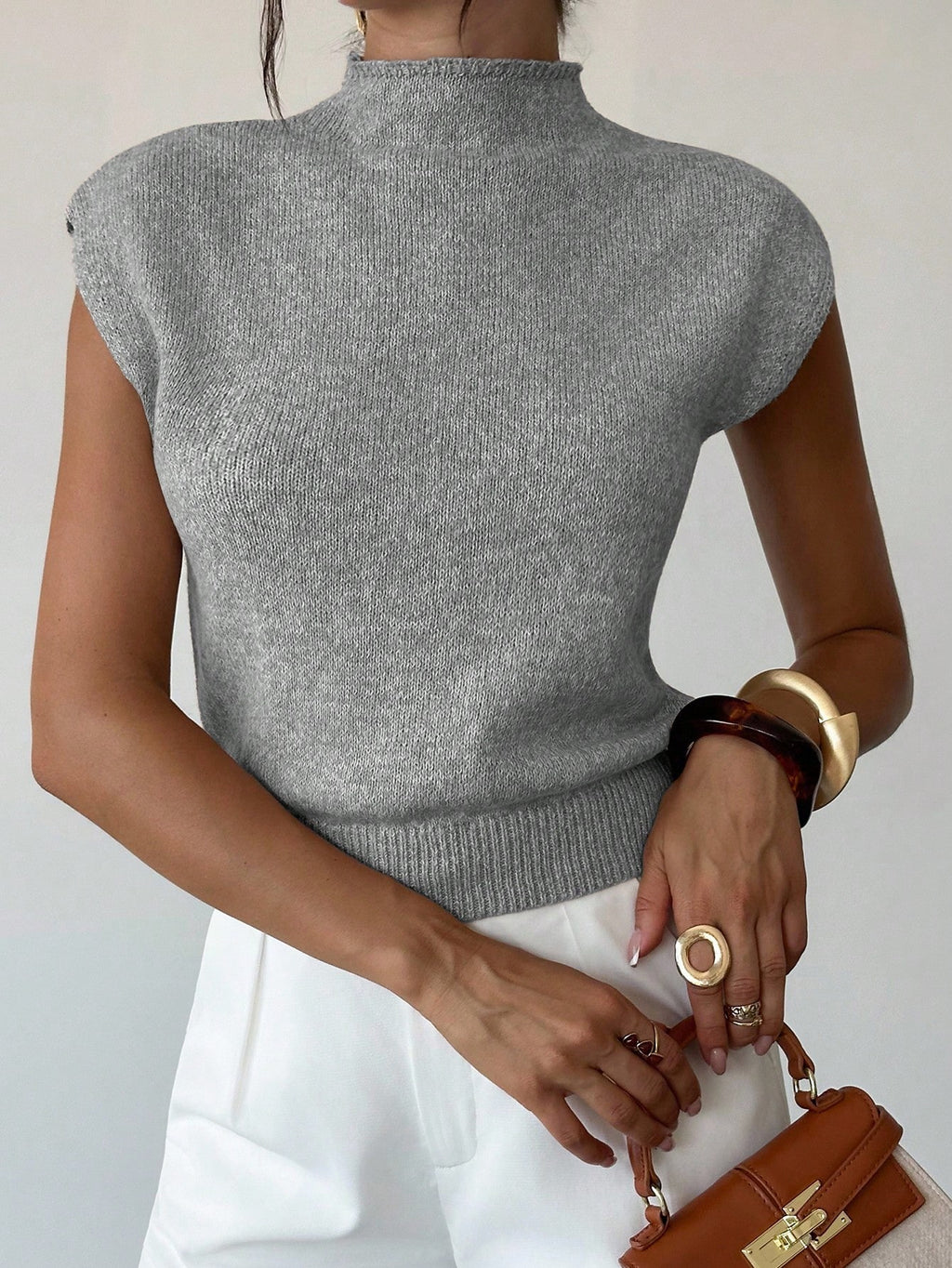 Elegant sleeveless knit vest, high neck, loose and versatile